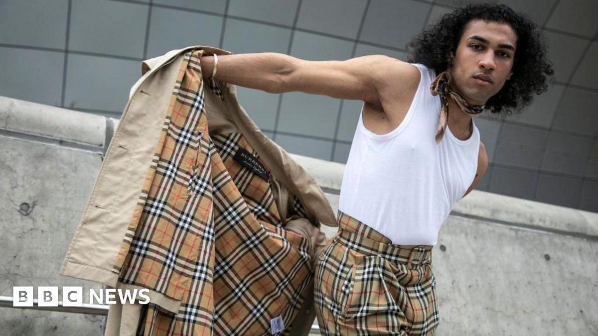 Burberry to cut 1,700 jobs as designer suffers heavy losses - BBC News