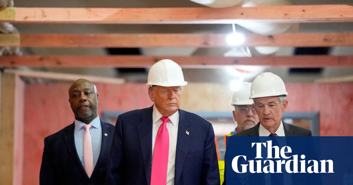 Divided Fed leaves interest rates unchanged despite Trump pressure | US interest rates | The Guardian
